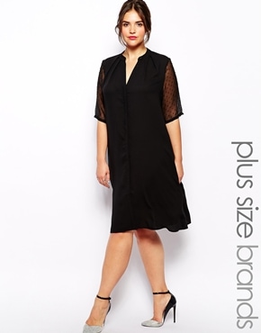 Asos – Carmakoma Robe chemise avec manches transparentes à pois – 138,02€